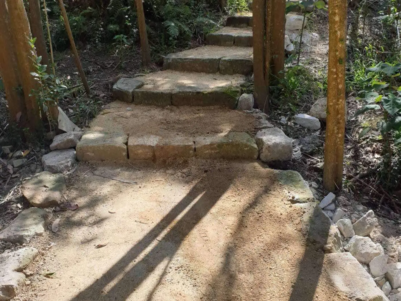 Stone stair and track construction in a natural setting