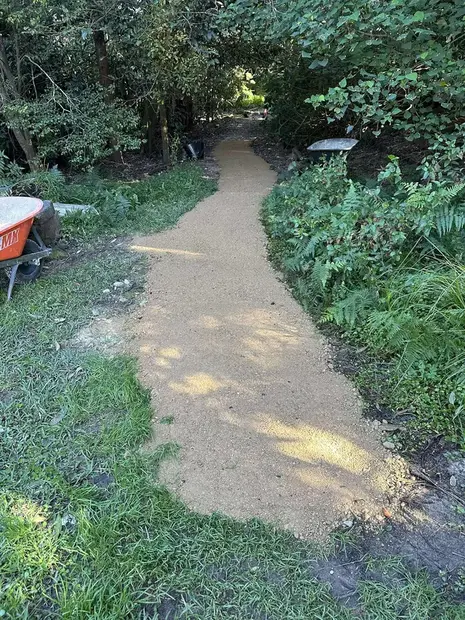 Completed compacted bushland track winding through native vegetation